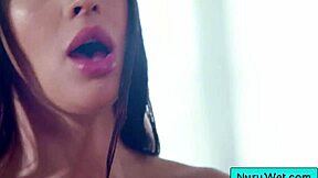 Two busty sluts fuck huge cock in slippery massage