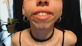 putting on nude colored lipstick and drooling all over it