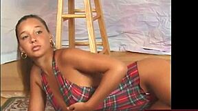 Busty teen dances sexily.