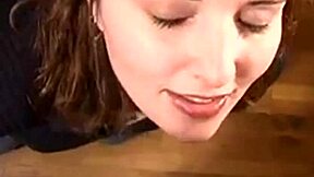 A brunette milf gets a facial from a big dick.