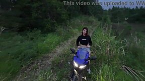 In the public woods, a redhead Latina amateur exposes her big tits for voyeurs