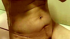 married woman 38 years old with beautiful nipples dripping with water in the bathroom