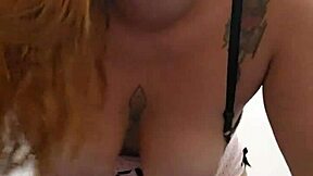 Redhead Flashes Breasts and Pink Pussy While Masturbating