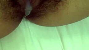 beautiful brunette enjoys being fucked on top while caressing her hairy pussy