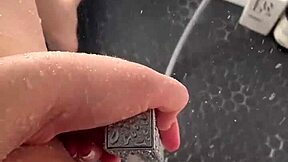 Stepsis unleashes fierce masturbation in a sunny shower with raw intensity.