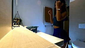 beautiful girl in blue miniskirt and panties looks stunning