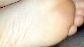 homemade bare footjob with girlfriend's feet in leggings, big cumshot on toes