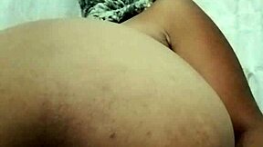 Latina brunette stretches big ass while masturbating.