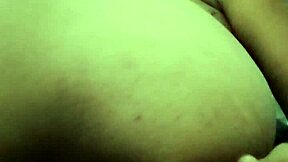 Latina brunette stretches big ass while masturbating.