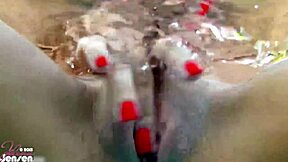 Sensual Jane teases with big pussy lips and dirty talk in lesbian play.