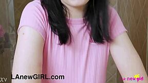 cute teen brunette takes a shower