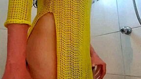 Horny latina girl masturbates in the bath, rubbing her breasts and showing her ass without panties.