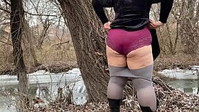 mother-in-law in white pantyhoses and big panties pees outdoors