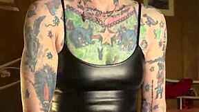 tattooed milf hotink4u orgasms intensely riding a dildo hard