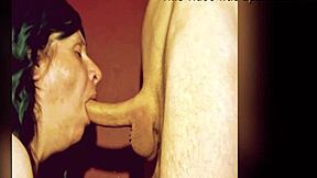 The goat is taking a long object deep in her throat