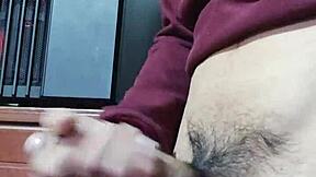 Young Latina amateur slaps her hard cock for a big cumshot solo