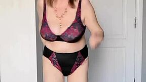 Granny performs striptease and invites you to explore her mature depths