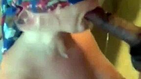 She's blindfolded and getting a sloppy face fuck from that monster cock.