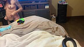 Young girl in lingerie lets guy boldly play with her shaved pussy using dildo vibrator