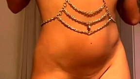 Hot tattooed brunette contrasts softcore play with dildo squirting satisfyer