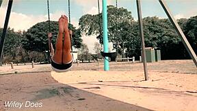 wife flashes big tits and shaved pussy on swing