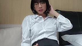 Shemale Ting Xuan in stockings and heels gives cumshot at office.