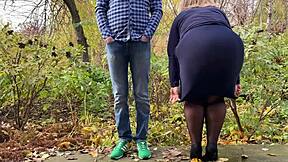 Mother-in-law peeing outdoors