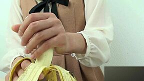 Asian Girl Crushes Banana In Hand Fetish!