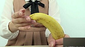 Asian Girl Crushes Banana In Hand Fetish!