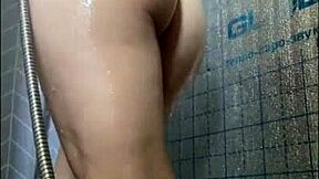 Teen bathes and shaves pussy in homemade shower