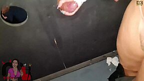 Sucking two big cocks in gloryhole with intense blowjob action.