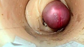 Camera captures a huge cum explosion deep inside a tight space.