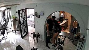 Latina woman flirts with the contractor in a playful manner