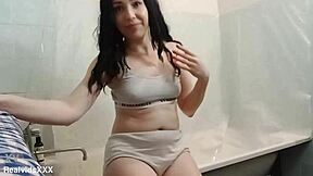 Brunette Cleans Ass With Water, Inserts Anal Plug, And Starts Bathroom Masturbation.