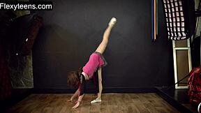Teen hot flexible model stretches limits in Russian gym session