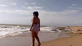 latina morena enjoys beach solo time