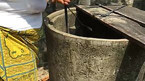 Dirty bitch gets anal fucked while doing laundry outside the compound.