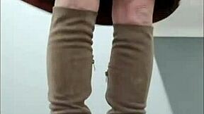 french housewife self-bonds in leather harness for outdoor exhibition