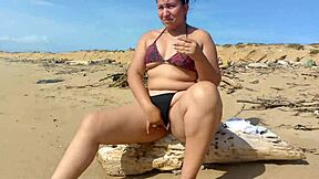 latina morena enjoys beach solo time