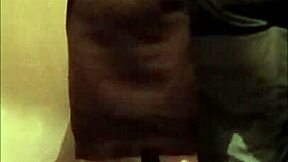 french housewife self-bonds in leather harness for outdoor exhibition