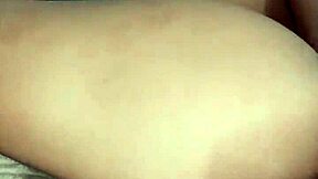 Pretty girl uses big black dildo on her small wet pussy.