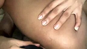 Pretty girl uses big black dildo on her small wet pussy.