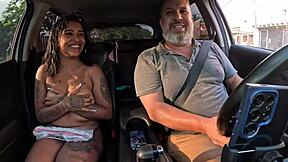 Maya Souza licks pussy in car for first time.