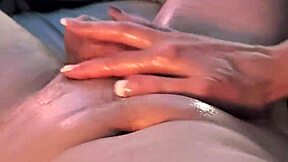 oiled couple's horny handjob session.