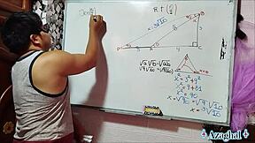 The nerdy asian student with brown eyes learns trigonometry in the bedroom with her teacher