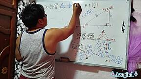 The nerdy asian student with brown eyes learns trigonometry in the bedroom with her teacher