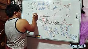 The nerdy asian student with brown eyes learns trigonometry in the bedroom with her teacher