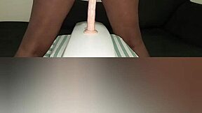 Beautiful ebony masturbates her clit while riding big black cock homemade