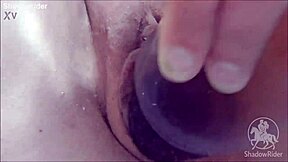 Girl enjoys toys in the bathtub