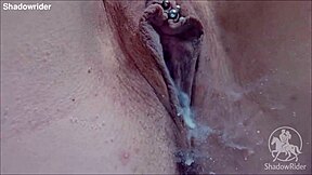 Girl enjoys toys in the bathtub